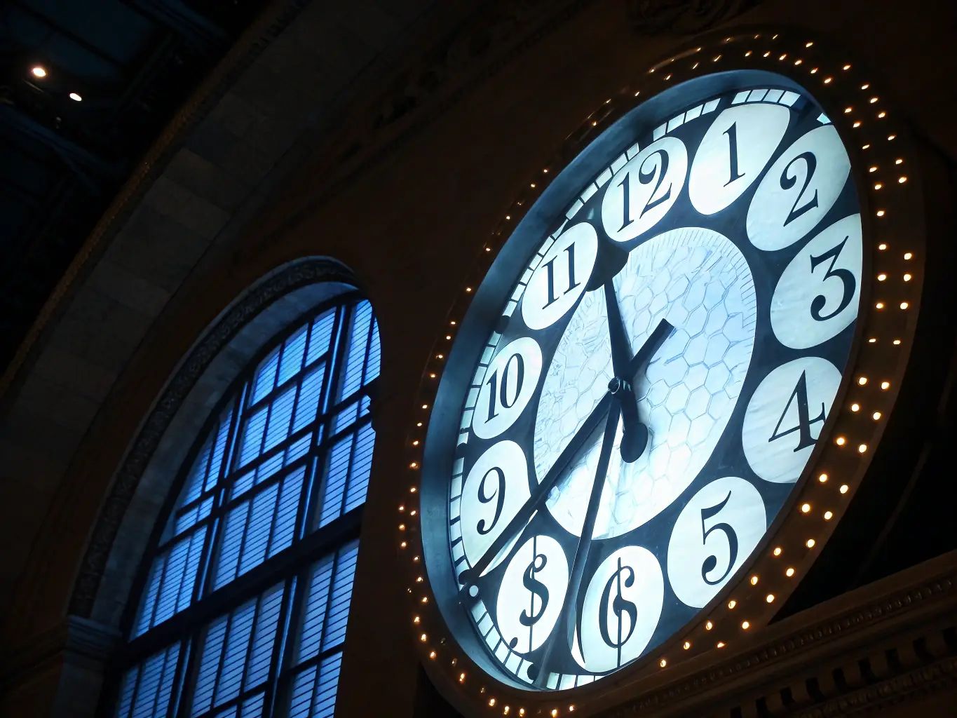An image depicting a clock with gears inside, symbolizing time-saving through automation, set against a backdrop of a modern office environment.